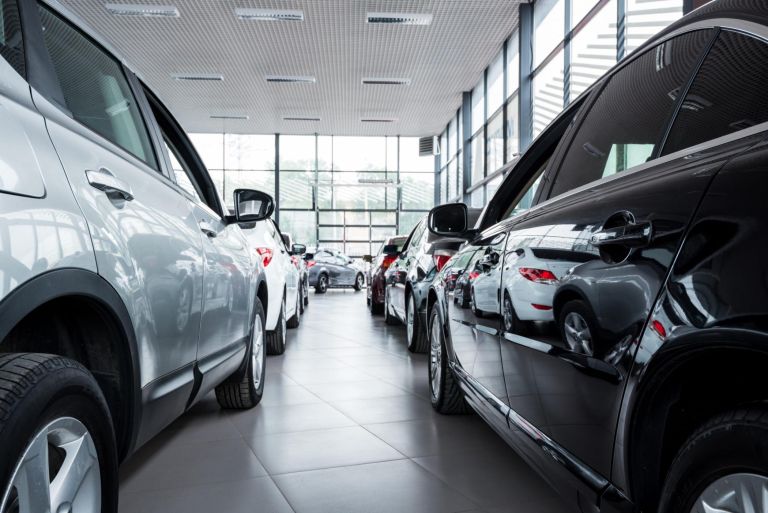 Stock of cars in showroom of automobile dealer